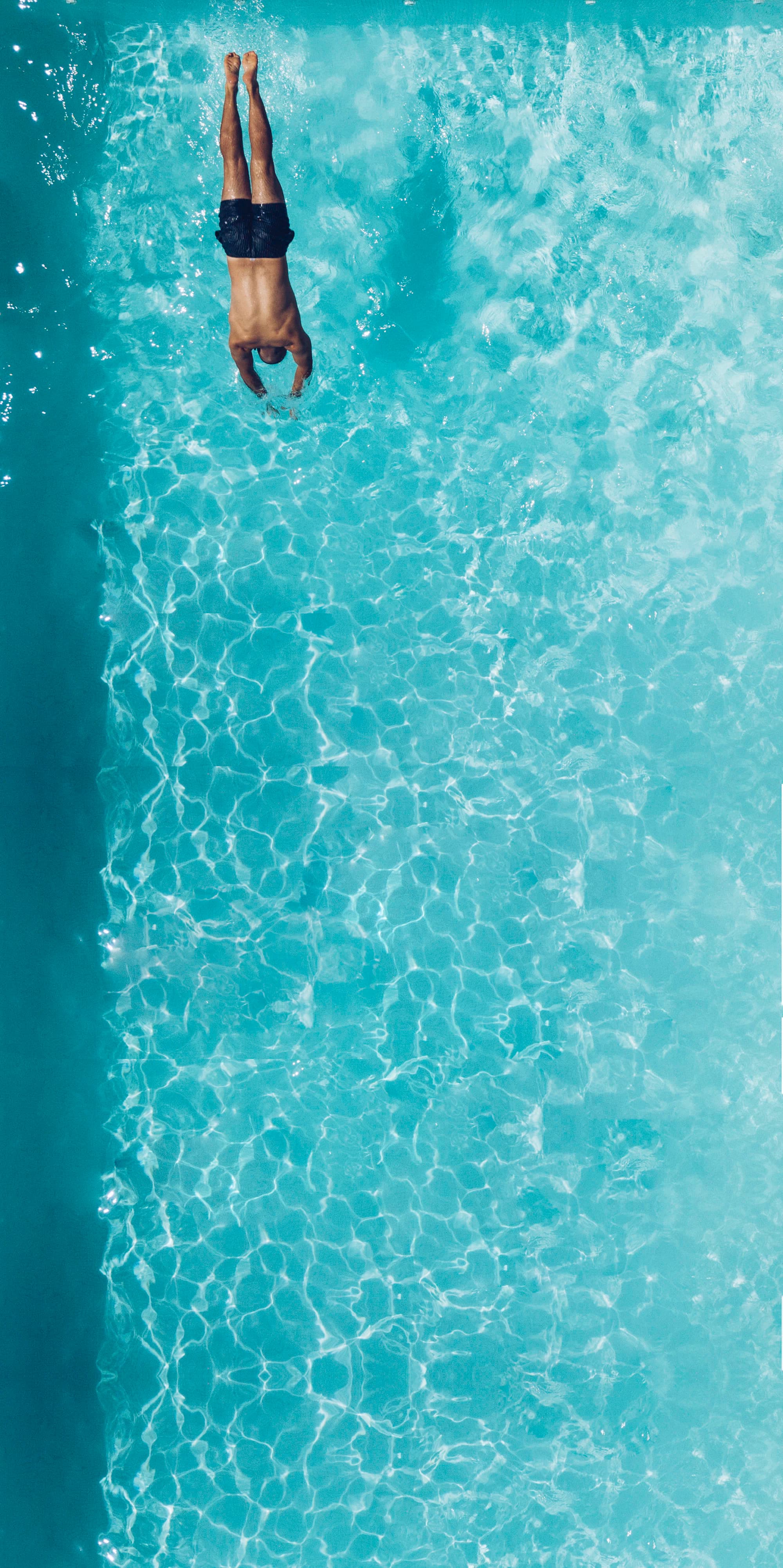 Contemporary leisure pool scene with architectural symmetry and soft lighting